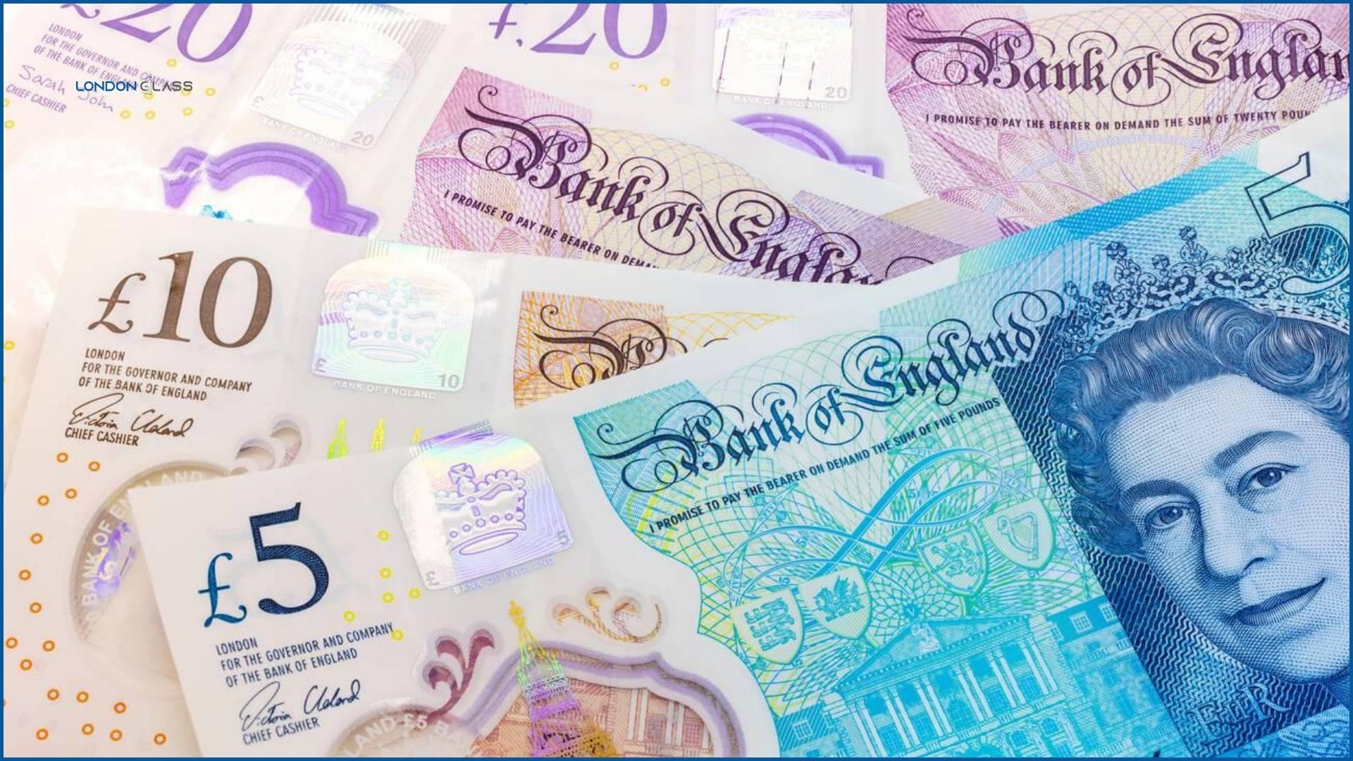 Close-up of British currency notes including £5, £10, and £20 bills