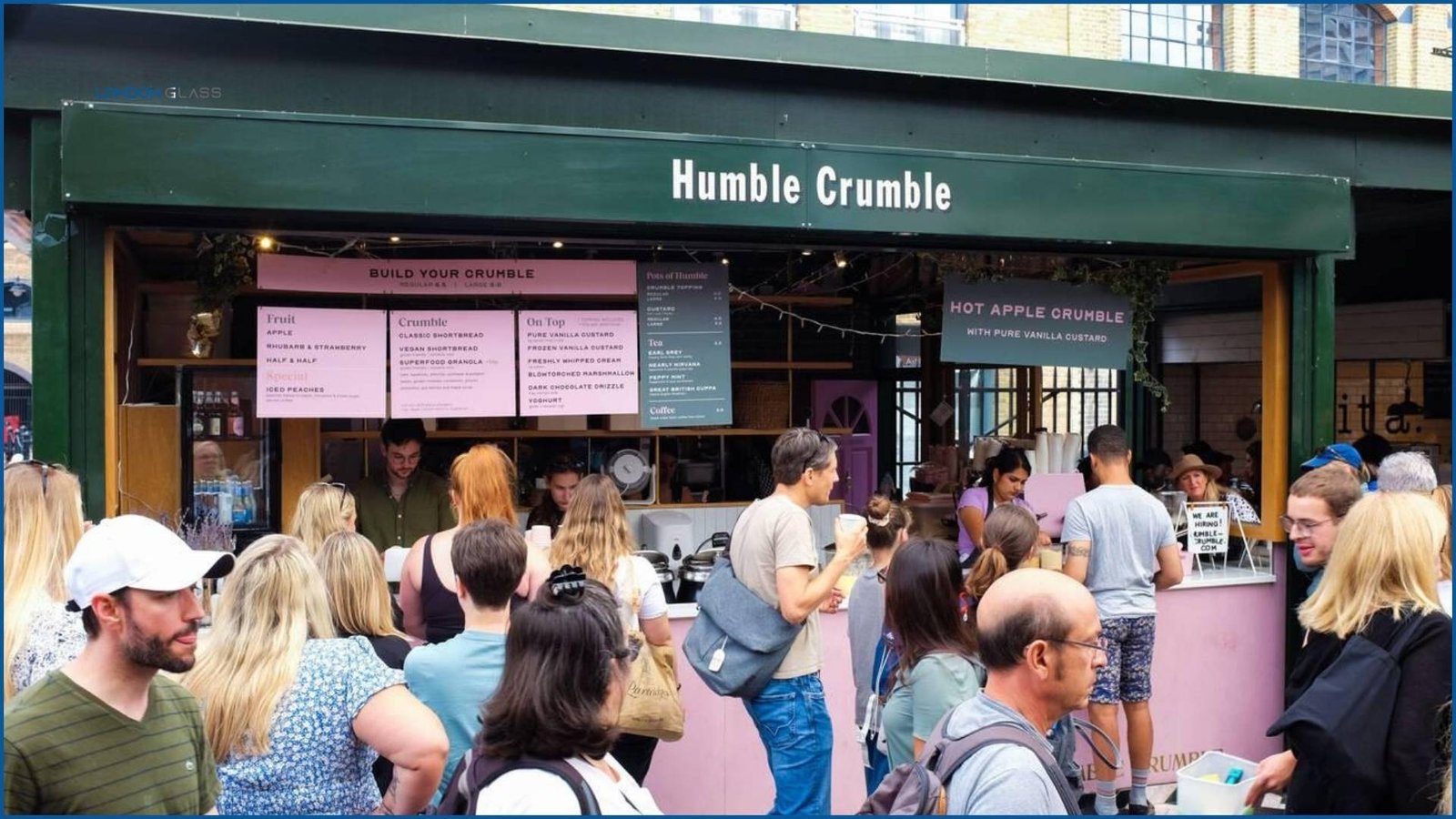 Visitors enjoying Humble Crumble desserts at Borough Market.