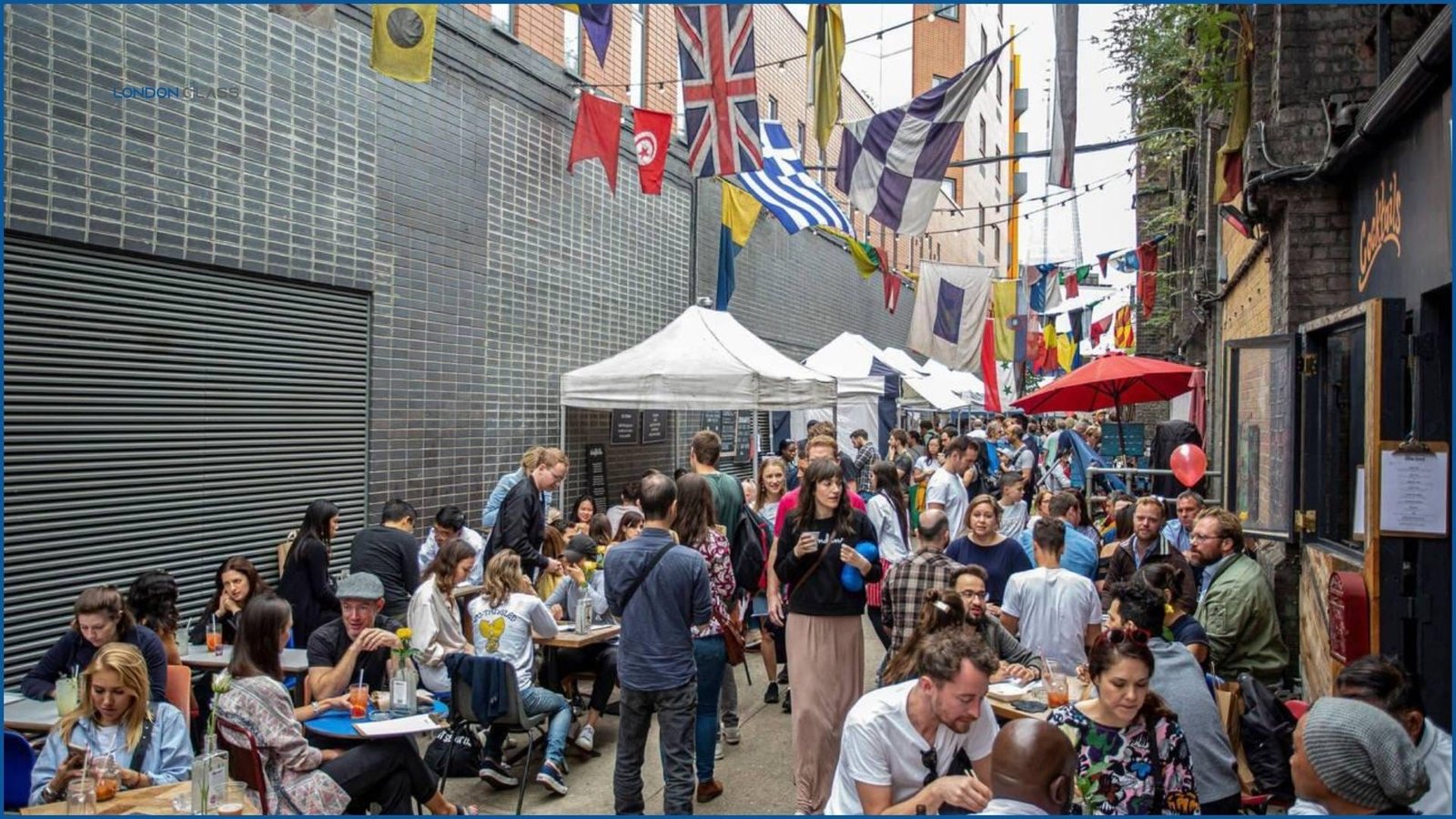 Crowds enjoying food and crafts at Maltby Street Market