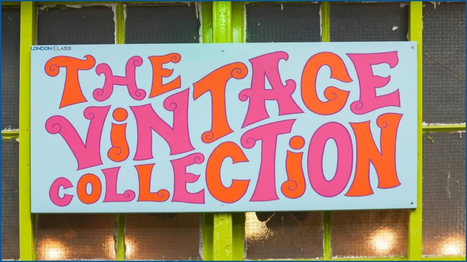 The Vintage Collection store sign at Camden Market, showcasing a vibrant and retro design.