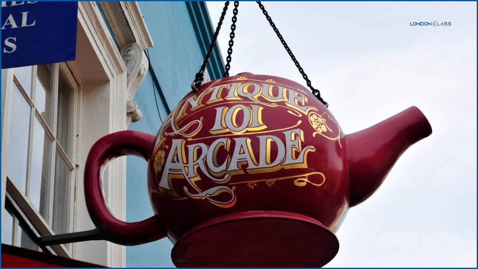 Antique 101 Arcade teapot sign at Portobello Road Market, London.