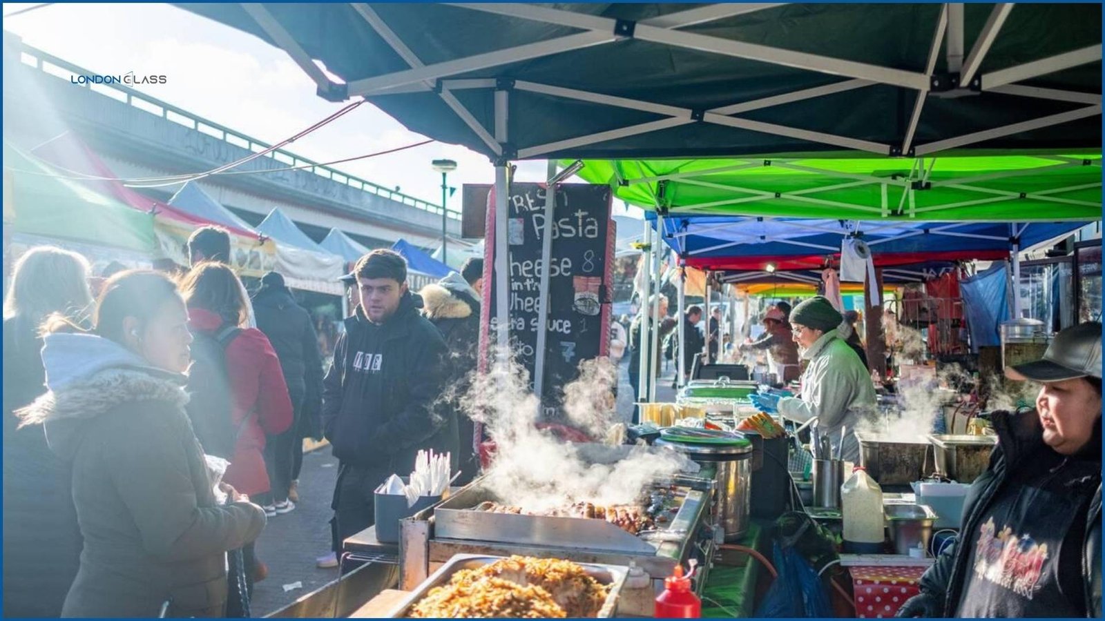 Crowd enjoying street food at a market near Latimer Road