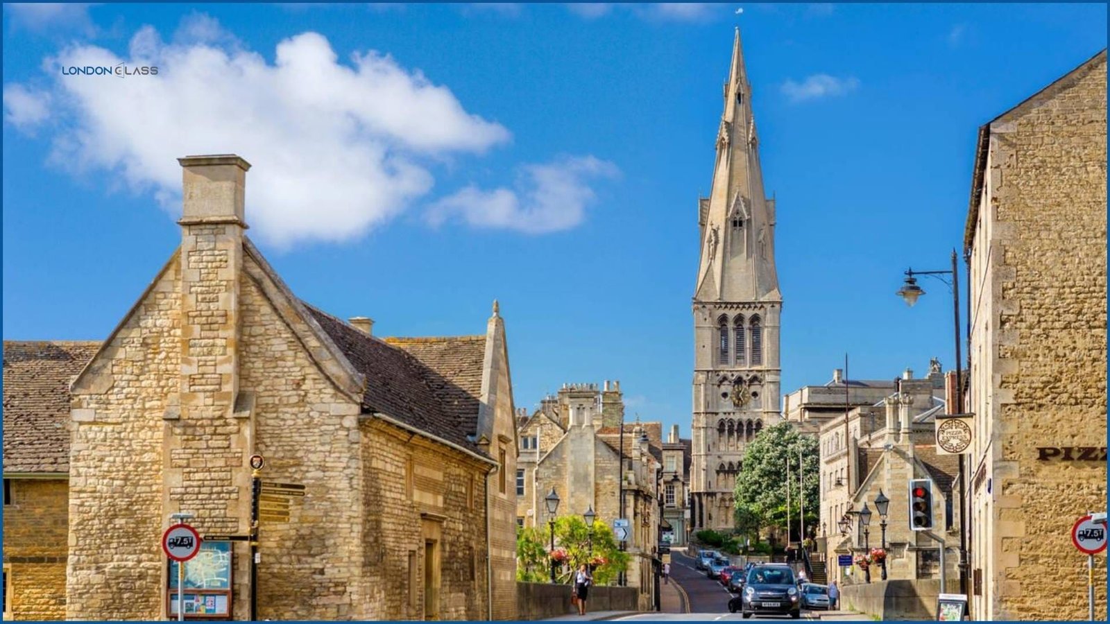 Historic church and stone buildings in a picturesque village scene