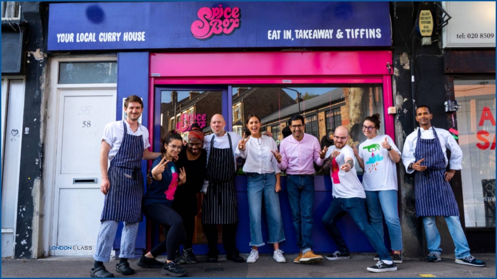 Team at Spice Box restaurant standing outside their local curry house.