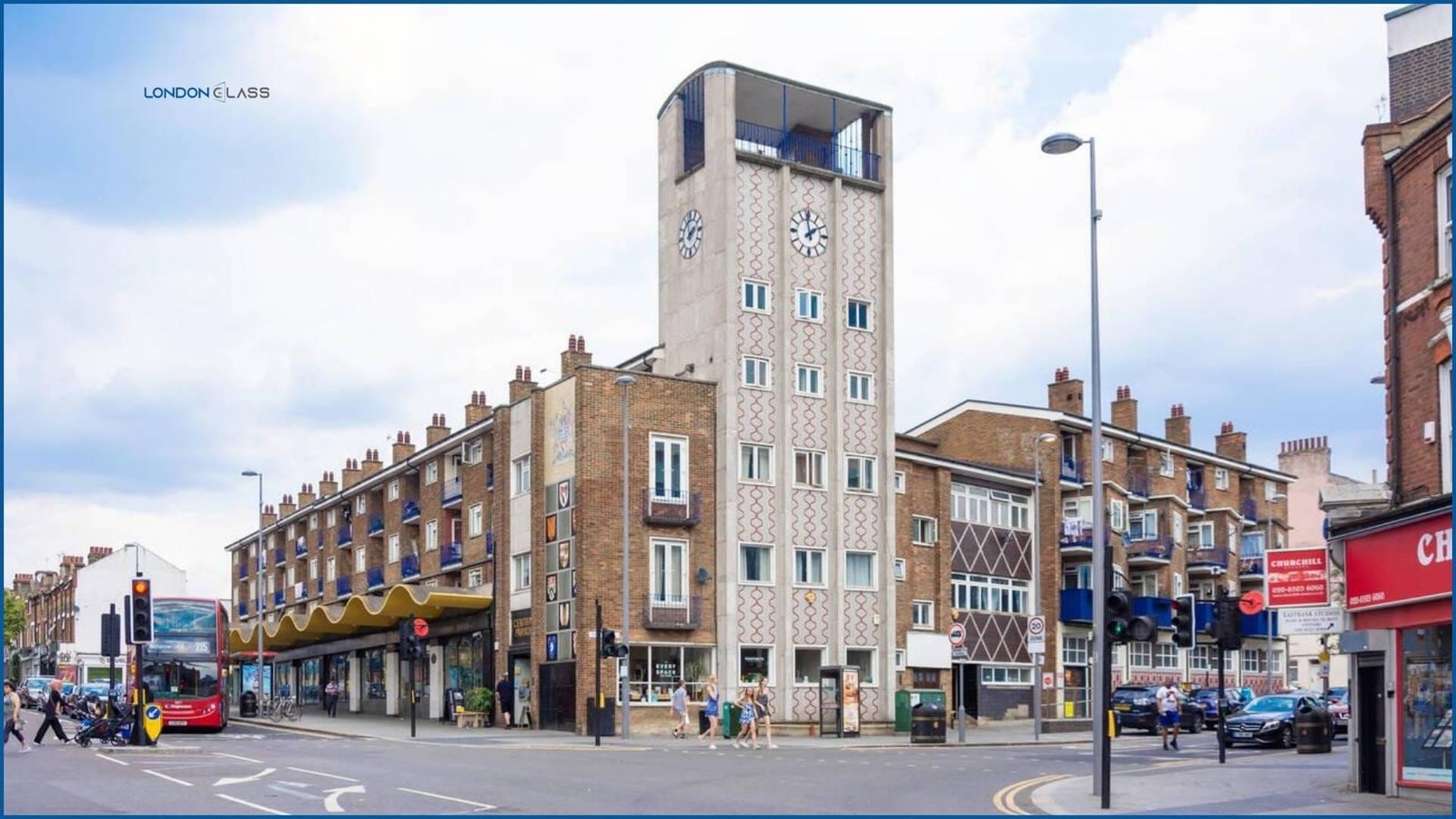 Clock tower at Central Parade in Walthamstow, with busy streets surrounding it.