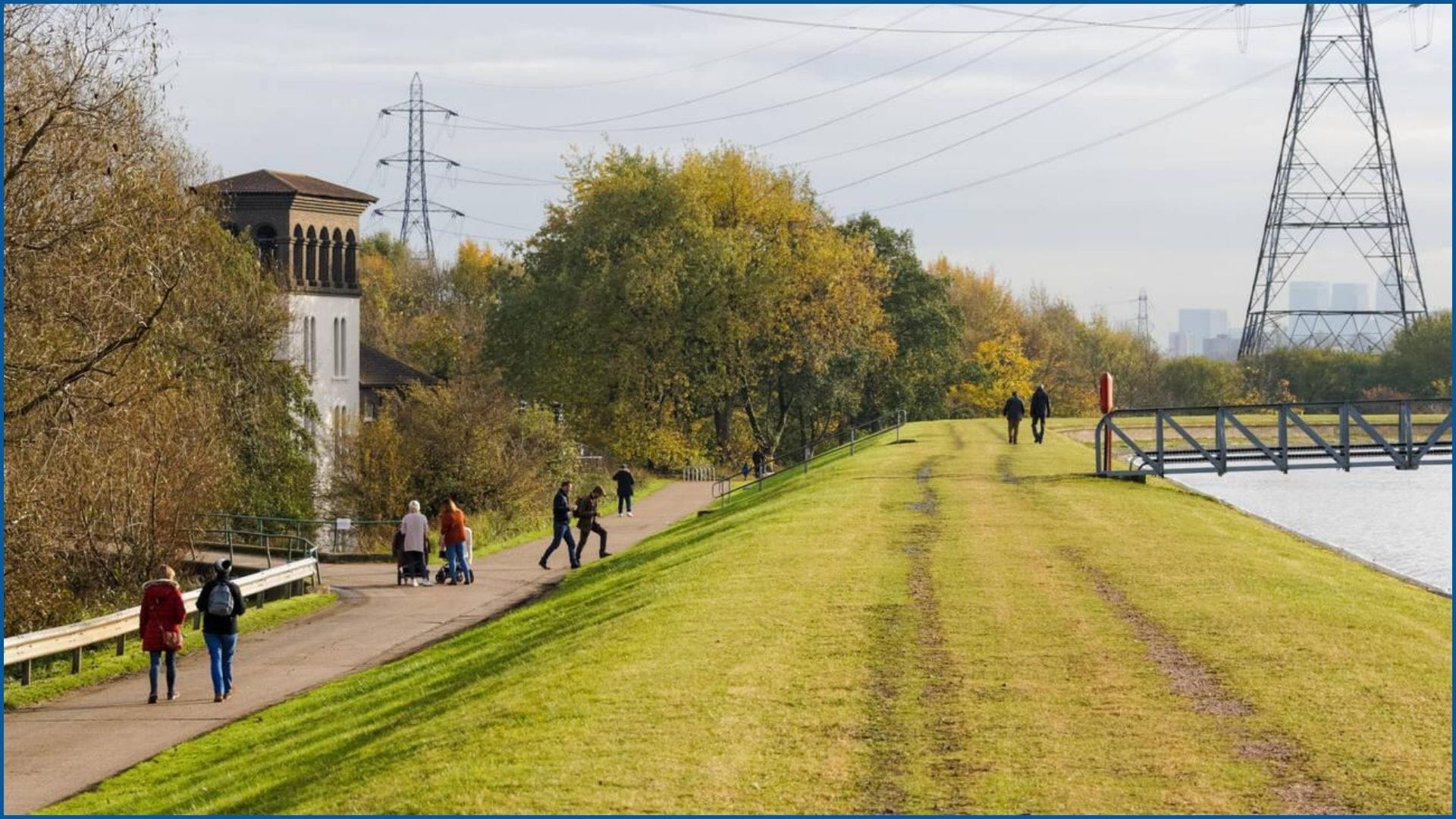 People walking along the path near Coppermill Tower in Walthamstow