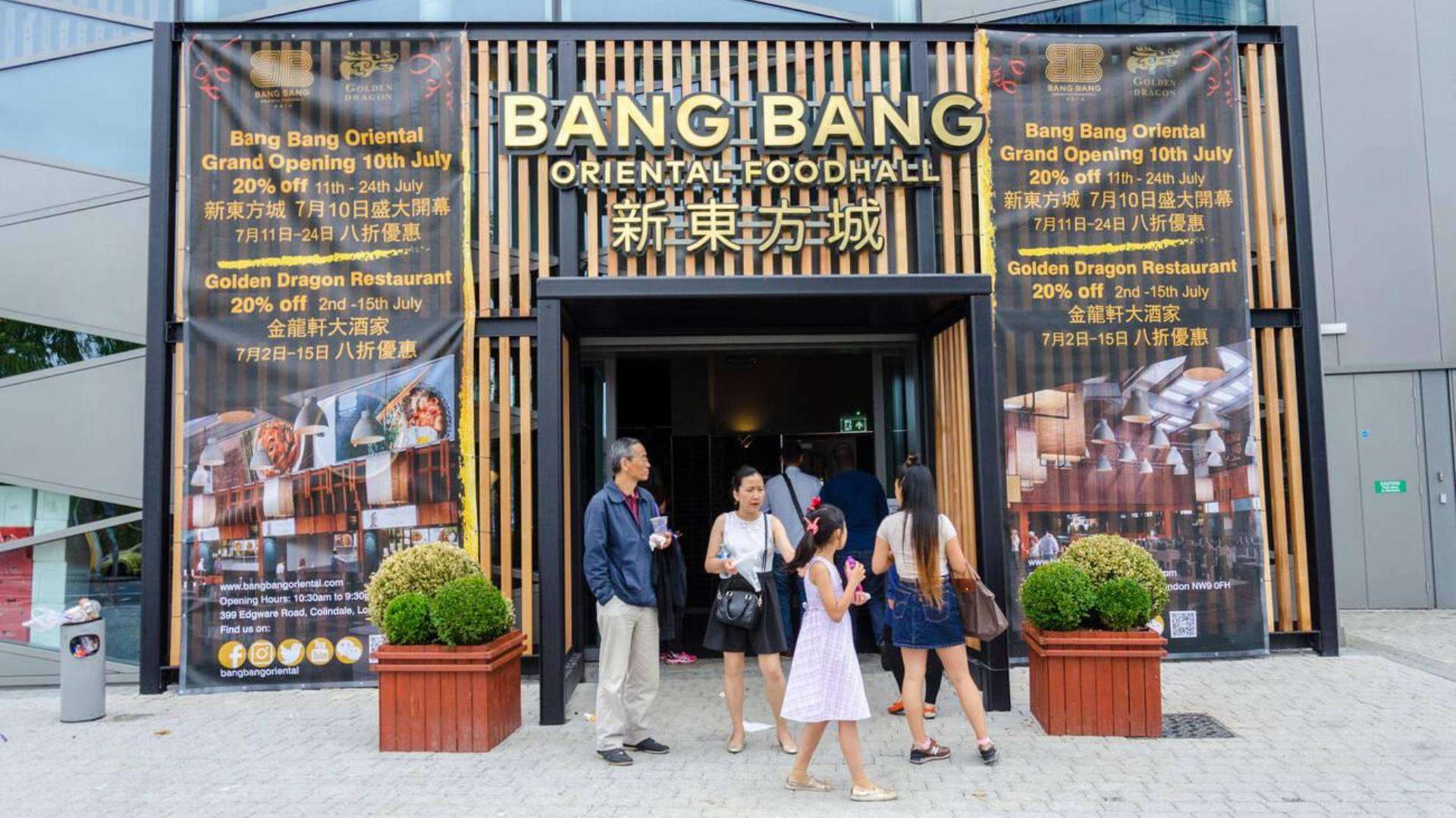 Entrance to Bang Bang Oriental Food Hall in Colindale with promotional banners and visitors.