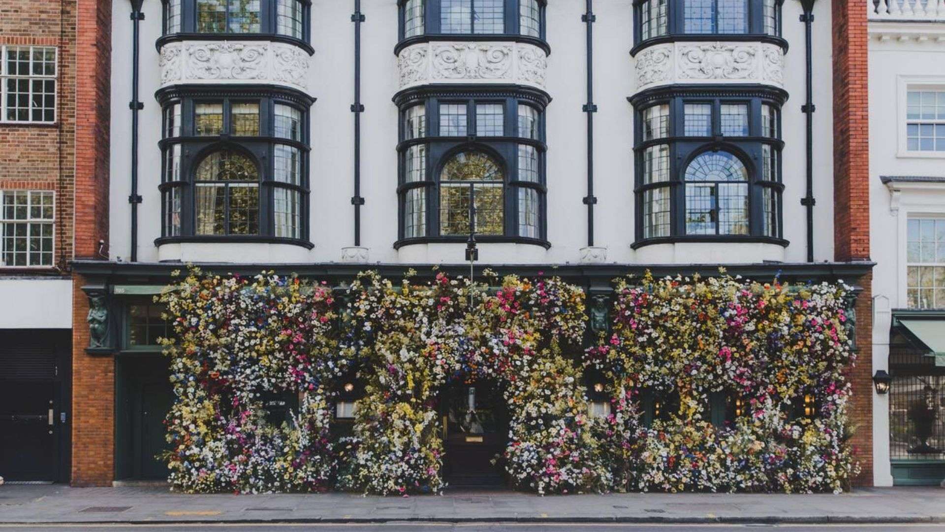 The Ivy Chelsea Garden with its iconic floral facade on King’s Road, London.